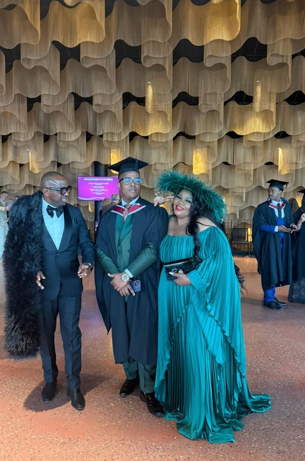 Alice celebrating a graduation with family